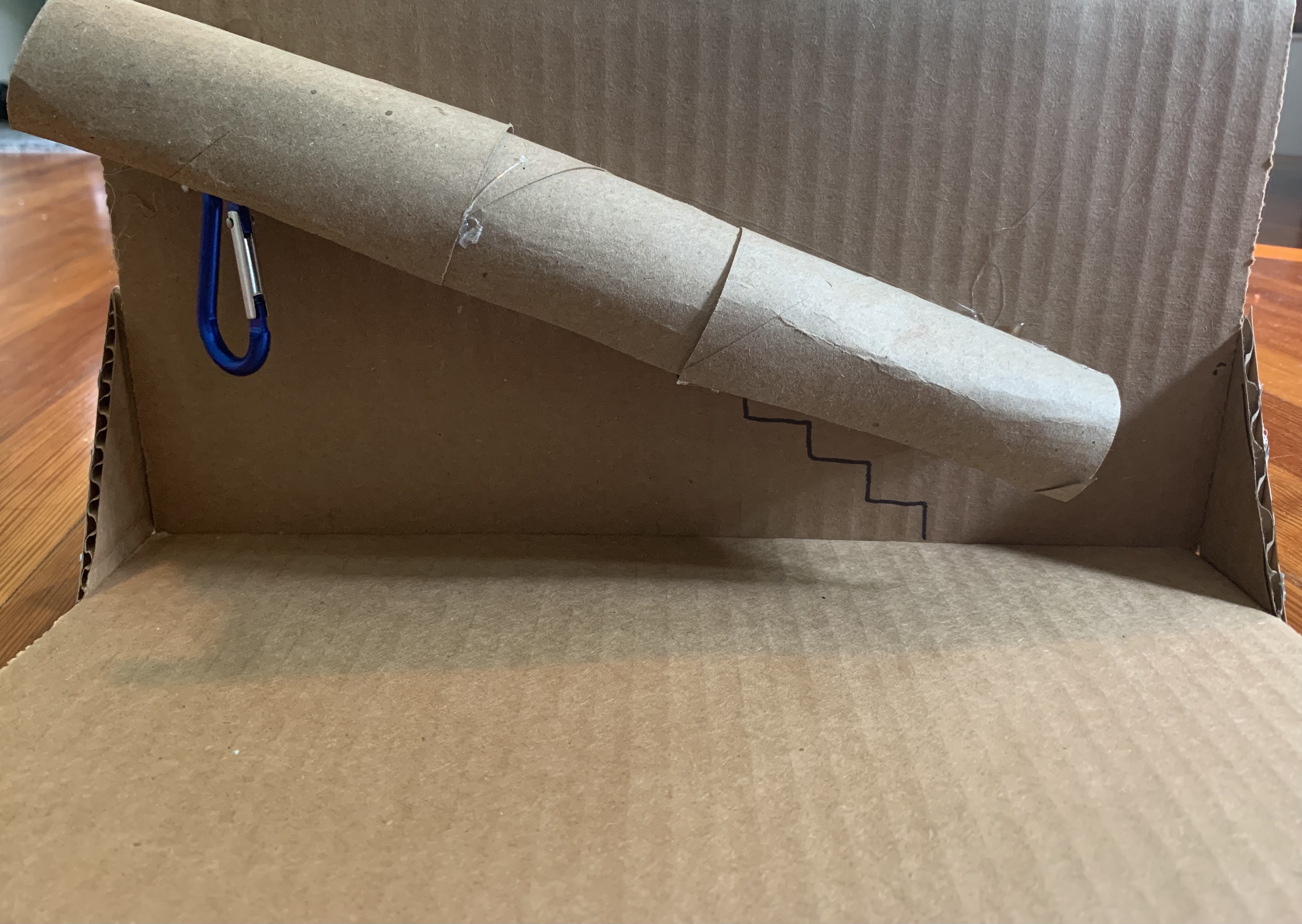 a cardboard prototype of the pulling system